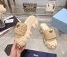 Женские плетёные шлепанцы Prada Monolith бежевые на тракторной подошве 2024