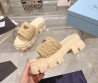 Женские плетёные шлепанцы Prada Monolith бежевые на тракторной подошве 2024
