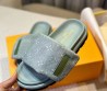 Женские текстильные шлепки Louis Vuitton голубые с монограммами 2024