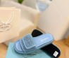 Женские шлепки Prada голубые с эффектом рафии 2024