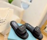 Женские шлепки Prada черные с эффектом рафии 2024