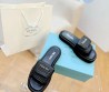 Женские шлепки Prada черные с эффектом рафии 2024