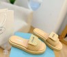 Женские шлепки Prada бежевые с эффектом рафии 2024