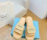 Женские шлепки Prada бежевые с эффектом рафии 2024