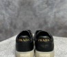Женские кожаные кроссовки Prada черные с логотипом 2024