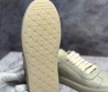 Женские кожаные кроссовки Prada серые с логотипом 2024