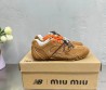 Женские замшевые кроссовки Miu Miu х New Balance 2024 коричневые с разноцветными шнурками