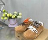 Женские замшевые кроссовки Miu Miu х New Balance 2024 коричневые с разноцветными шнурками