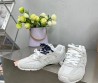 Женские комбинированные кроссовки Miu Miu х New Balance светло-серые с разноцветными шнурками 2024