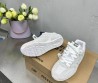 Женские комбинированные кроссовки Miu Miu х New Balance светло-серые с разноцветными шнурками 2024