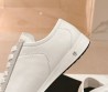Женские кожаные кроссовки Chanel белые с черным носом 2024