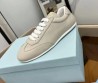 Женские кожаные кроссовки Prada бежевые 2024