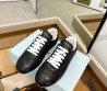 Женские кожаные кроссовки Prada черные 2024