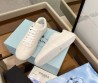 Женские кожаные кроссовки Prada молочные 2024