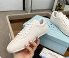 Женские кожаные кроссовки Prada молочные 2024