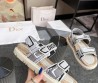 Женские текстильные сандалии Christian Dior белые с черным 2024