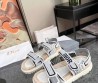 Женские текстильные сандалии Christian Dior белые с черным 2024