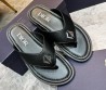 Мужские кожаные шлепанцы Christian Dior черные с серебристым украшением 2024