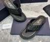 Мужские кожаные шлепанцы Christian Dior черные с рельефными логотипами 2024