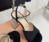 Женские атласные босоножки Miu Miu черные со стразами 2024 каблук 10 см