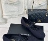 Женские текстильные балетки с ремешком Chanel черные 2024
