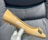 Женские кожаные балетки Salvatore Ferragamo Varina ballet flat бежевые лакированные 2024