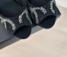 Женские замшевые босоножки Chanel черные в стразах каблук 10,5 см 2024