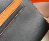 Женская кожаная сумка Hermes Kelly Seller черная с коричневой ручкой 28 см 2024