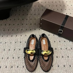 Женские плетеные туфли Alaia Jewel черные с золотой пряжкой 2024