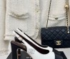 Женские кожаные туфли Chanel белые с черным каблук 9,5 см 2024