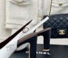 Женские кожаные туфли Chanel белые с черным каблук 9,5 см 2024