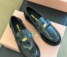 Женские кожаные лоферы Miu Miu черные глянцевые 2024