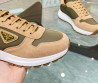 Женские комбинированные кроссовки Prada бежевые с зеленым 2024