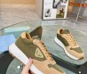 Женские комбинированные кроссовки Prada бежевые с зеленым 2024