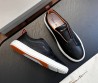 Мужские кожаные кеды без шнурков Santoni черные 2024