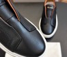 Мужские кожаные кеды без шнурков Santoni черные 2024