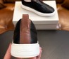 Мужские кожаные кеды без шнурков Santoni черные 2024