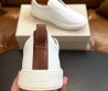 Мужские кожаные кеды без шнурков Santoni белые 2024