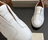 Мужские кожаные кеды без шнурков Santoni белые 2024