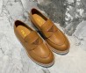 Женские кожаные лоферы Prada коричневые с логотипом на толстой подошве 2024