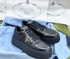 Женские кожаные кроссовки на платформе Prada черные 2024