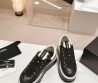 Женские кожаные кроссовки Chanel на платформе черные с прострочкой 2024