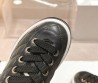 Женские кожаные кроссовки Chanel на платформе черные с прострочкой 2024