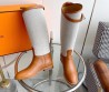 Женские кожаные сапоги Hermes коричневые с текстильной вставкой 2024