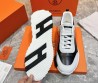 Мужские кожаные кроссовки Hermes черные с белым замшевым носом 2024