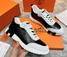 Мужские кожаные кроссовки Hermes черные с белым замшевым носом 2024