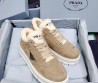 Женские замшевые кроссовки Prada бежевые c мехом 2024