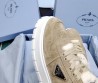 Женские замшевые кроссовки Prada бежевые c мехом 2024