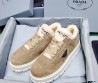 Женские замшевые кроссовки Prada бежевые c мехом 2024