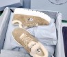 Женские замшевые кроссовки Prada бежевые c мехом 2024